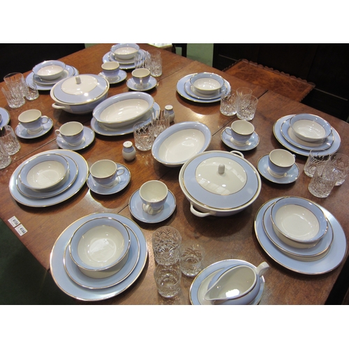 4164 - A quantity of Royal Doulton ‘Oldfield’ pattern tea and dinner ware, white ground with blue band and ... 