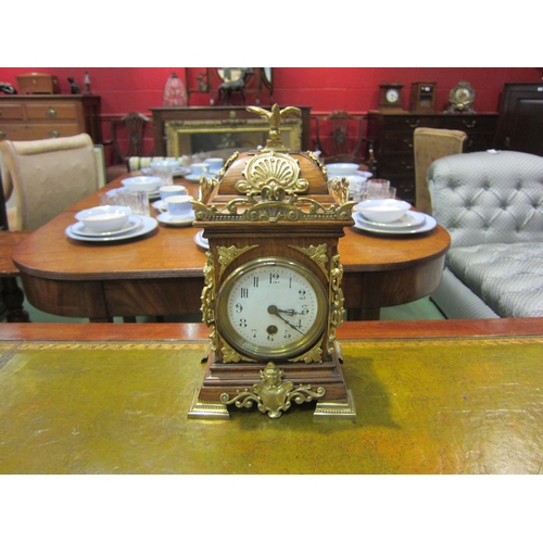 4177 - A mantel timepiece, mahogany case with brass ornamentation.  Enamel 3.5