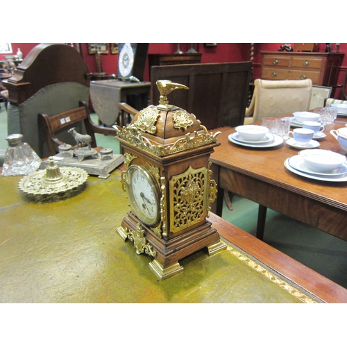 4177 - A mantel timepiece, mahogany case with brass ornamentation.  Enamel 3.5