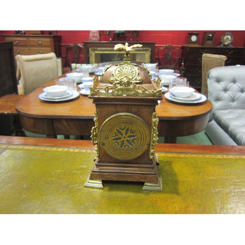 4177 - A mantel timepiece, mahogany case with brass ornamentation.  Enamel 3.5