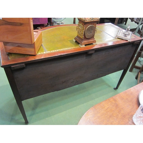 4179 - An Edwardian crossbanded mahogany breakfront desk the gilt tooled leather writing surface over a cen... 