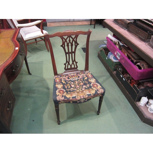 4180 - A George III mahogany chair with bow front tapestry seat, the Chippendale design back rest over carv... 