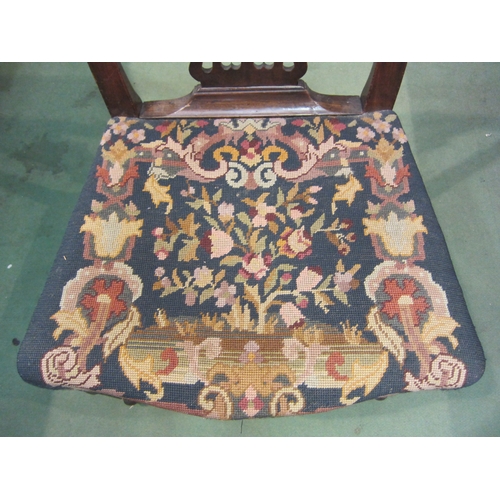 4180 - A George III mahogany chair with bow front tapestry seat, the Chippendale design back rest over carv... 