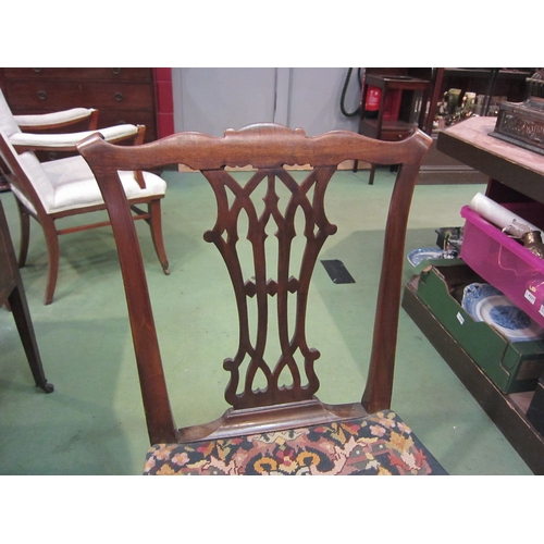 4180 - A George III mahogany chair with bow front tapestry seat, the Chippendale design back rest over carv... 