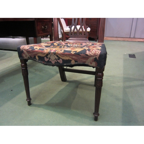 4180 - A George III mahogany chair with bow front tapestry seat, the Chippendale design back rest over carv... 