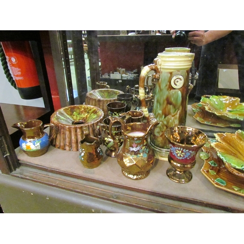 4250 - A quantity of copper lustre wares and 19th Century majolica style ceramics