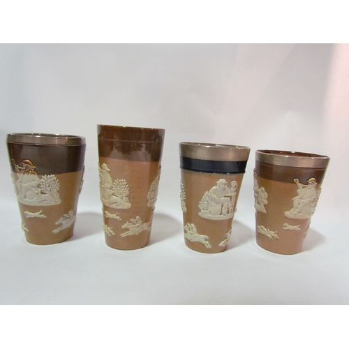 4271 - Four Royal Doulton stoneware beakers, three with silver rims, one a/f, tallest 14cm