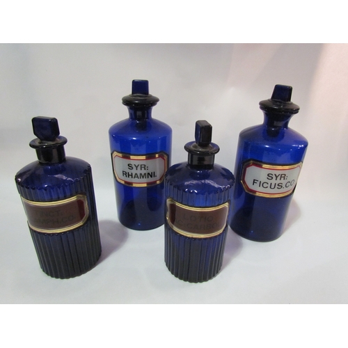 4284 - Two pairs of Bristol blue apothecary jars