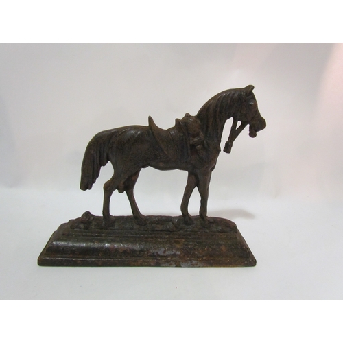 4286 - A cast iron horse doorstop, 21cm tallest point