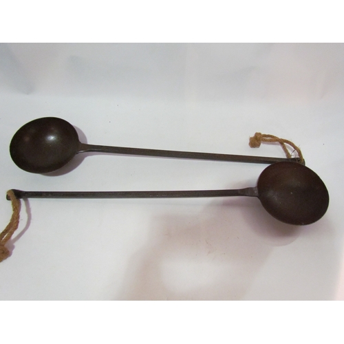 4295 - Two cast iron ladles