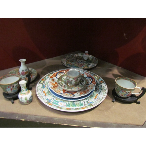 4303 - Two Cantonese plates, 31cm and 25cm diameter, one a/f, Canton cups and saucers, three miniature fami... 