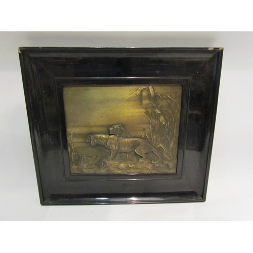 4360 - Three gilt metal wall reliefs of lions and wild boar, various sizes, ebonised lacquered frames