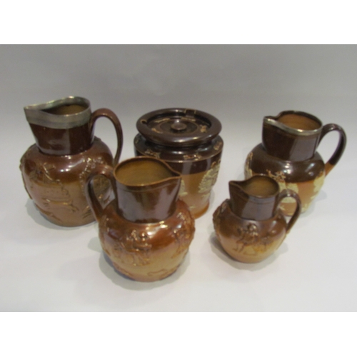 4387 - Two Royal Doulton harvest jugs with silver rims, two other harvest ware jugs and a canister (5)   (E... 