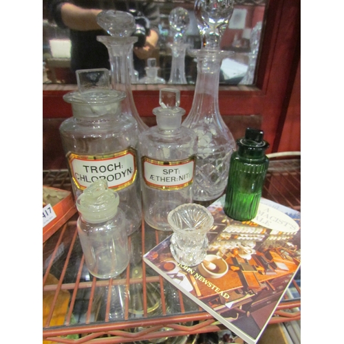 4418 - Four glass apothecary jars, 