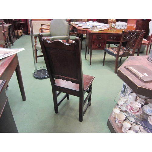 4110 - An early 18th Century oak chair with later armorial plaque, the flat seat over turned fore legs unit... 