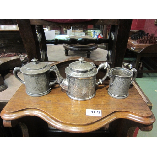 4191 - A 19th Century Rogers and Bros. plated three piece tea set decorated with gnomes and fairies