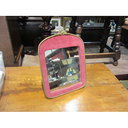 4196 - A French pink velvet and gilt dressing table mirror