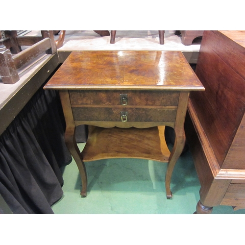 4203 - A Circa 1920 French Art Deco burr walnut two drawer chest, the quarter veneered top over square cabr... 