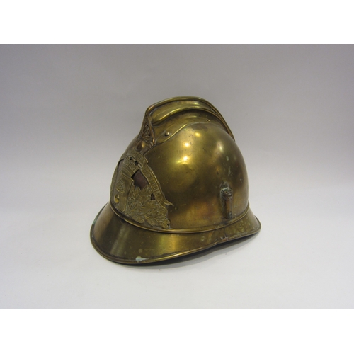 4214 - A 19th Century French brass fireman's helmet, 'Sapeurs Pompiers De St. Aubin R'