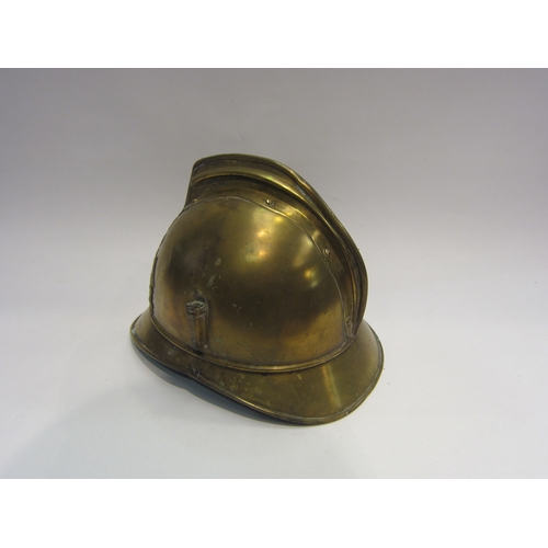 4214 - A 19th Century French brass fireman's helmet, 'Sapeurs Pompiers De St. Aubin R'