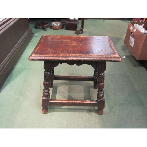 4220 - A Jacobean style oak joined stool with turned supports joined by a stretcher, 46cm tall x 46cm long ... 