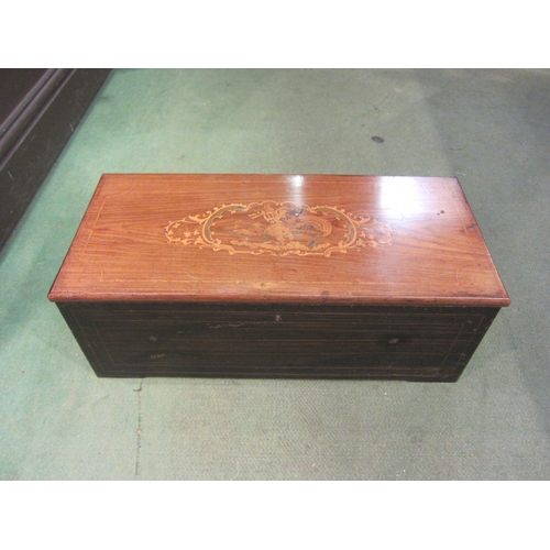 4224 - A 19th Century cylinder music box converted into a trinket box, marquetry top, together with a rusti... 