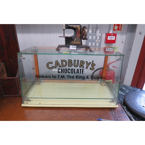 2130 - A 1950's seal glass confectionary cabinet painted Cadbury's chocolate  (R)  £150