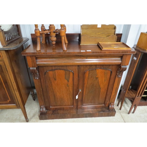 2161 - An early 19th Century rosewood chiffonier, with cushioned frieze drawer (a/f). With key