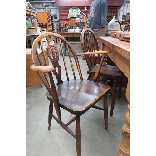 2351 - An Ercol dark windsor elbow chair and three others