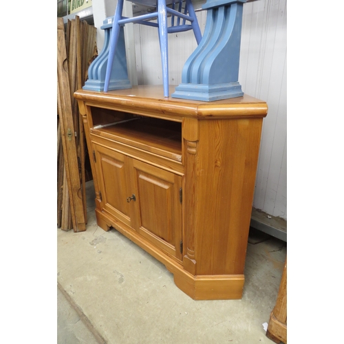 2370 - A pine corner stand/cabinet, two door base