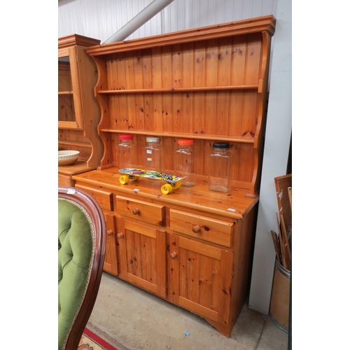 2441 - A modern pine dresser, the plate rack top over three drawer and three door cupboard