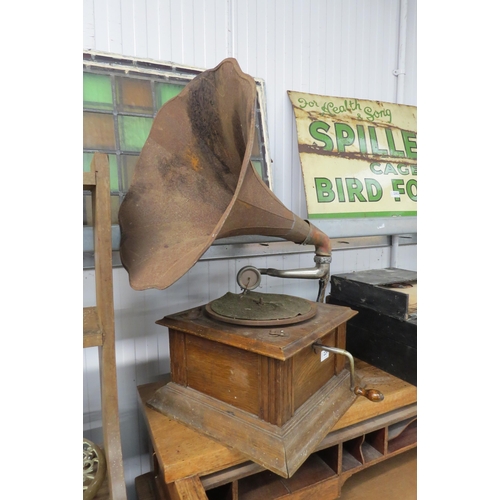 2299 - A 1930's oak gramophone with a metal horn