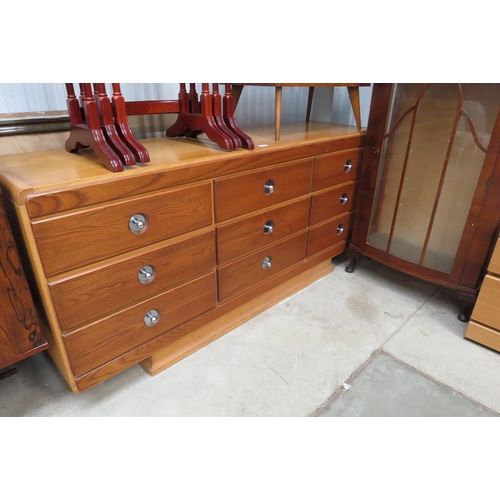 2491 - A mid Century nine drawer side unit with chrome handles