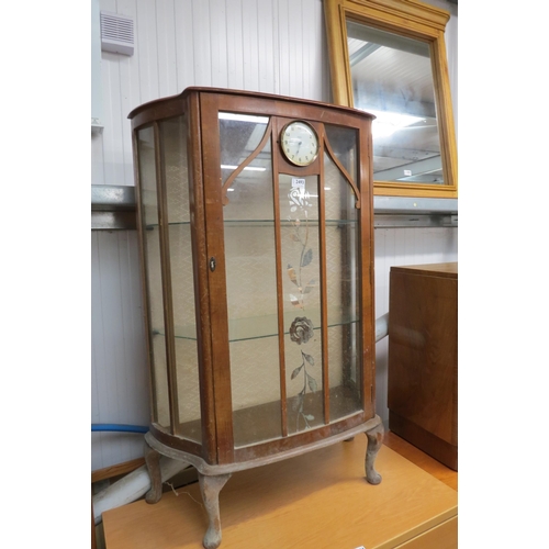 2493 - A 1930's walnut display cabinet with clock   (D)