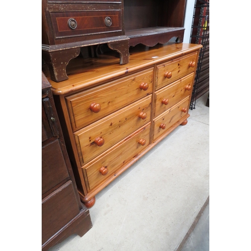 2504 - A modern pine chest of six drawers