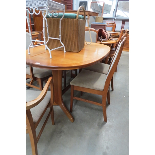 2505 - A 1970's teak extending dining table   (E)  £10-20