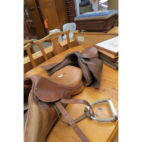 2507 - Two  leather horse saddles, one HDR France.