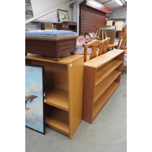 2510 - A light oak half-height bookcase with three tiers of shelving and another