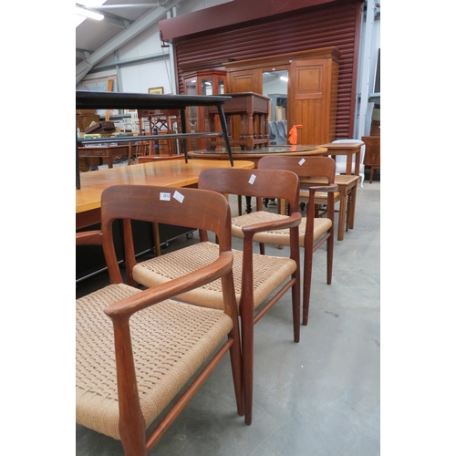 2513 - A set of three mid-20th Century open arm chairs with string seats