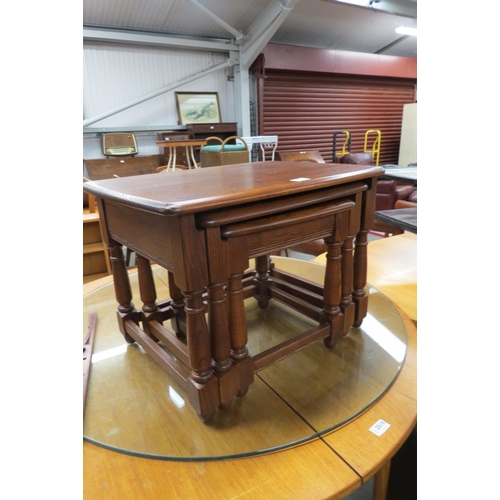 2514 - An Ercol nest of three fitting tables   (R) £20