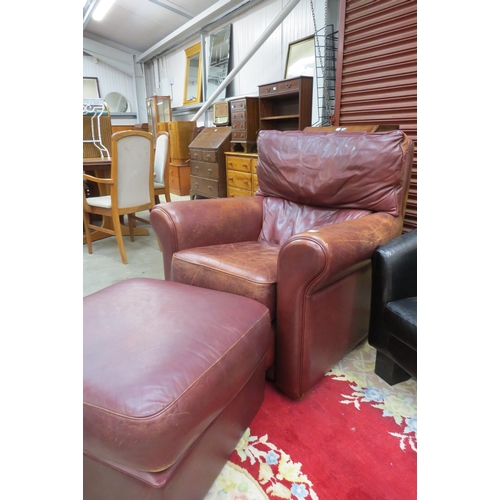 2525 - A brown leather arm-chair with foot stool    (R)  £50