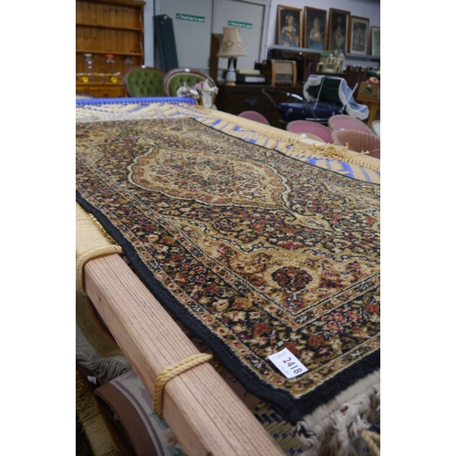 2418 - A small rug 69 x 134cm