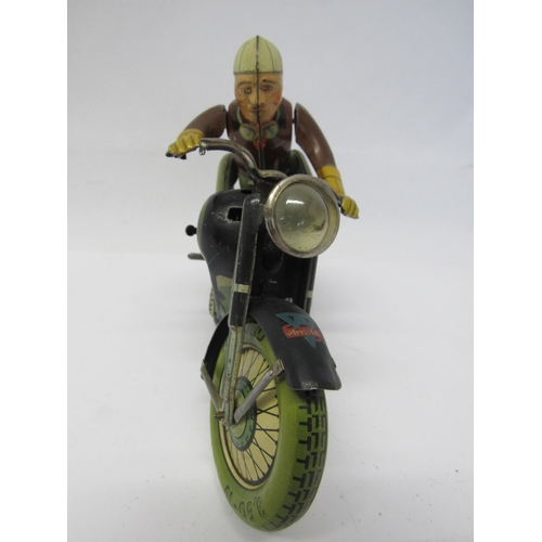 7191 - A rare Arnold Mac 700 tinplate clcokwork motorcycle and rider, made in US Zone Germany. The motorcyc... 