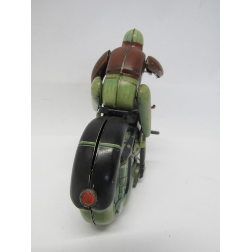 7191 - A rare Arnold Mac 700 tinplate clcokwork motorcycle and rider, made in US Zone Germany. The motorcyc... 