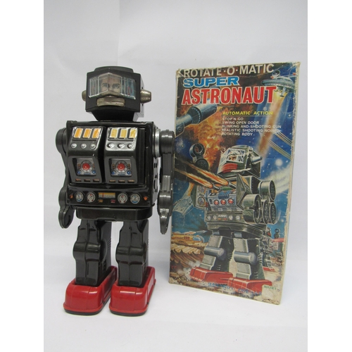 7164 - A Horikawa (SH Toys of Japan) battery operated Rotate-O-Matic Super Astronaut robot, dark metallic g... 