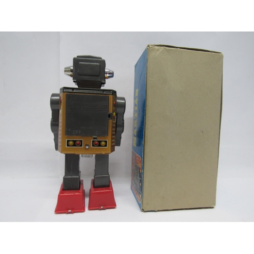 7163 - A Horikawa (SH Toys of Japan) battery operated Attacking Martian robot, litho-printed tinplate body ... 