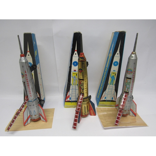 7168 - Two boxed Lemzaru Gyar (Hungary) friction drive tinplate 'Holdraketa' moon rocket spaceships and one... 