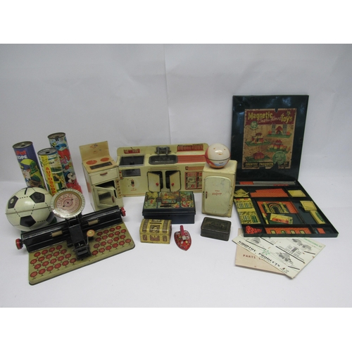 7068 - A group of mixed tinplate toys including Welwash kitchen sink and washing machine, Welcook cooker an... 