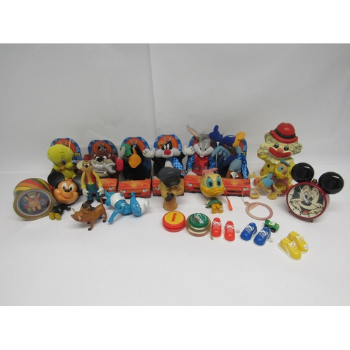 7063 - A collection of cartoon character toys to include a set of six Shell Loony Tunes soft toys, wind-up ... 