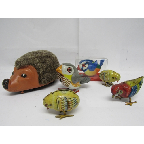 7193 - A Lehmann (Germany) 936 Nunu clockwork hedgehog, two Lehmann clockwork tinplate pecking birds to inc... 